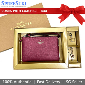 Coach on sale wristlet sg