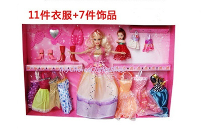 barbie doll with dresses and shoes