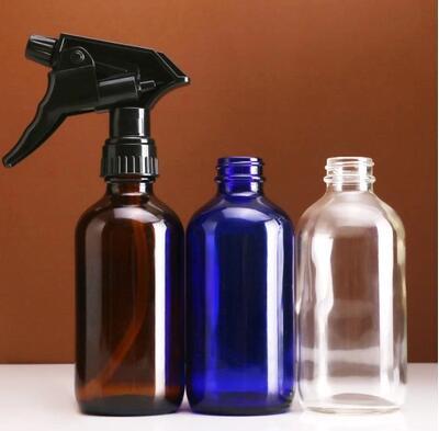 large glass spray bottle