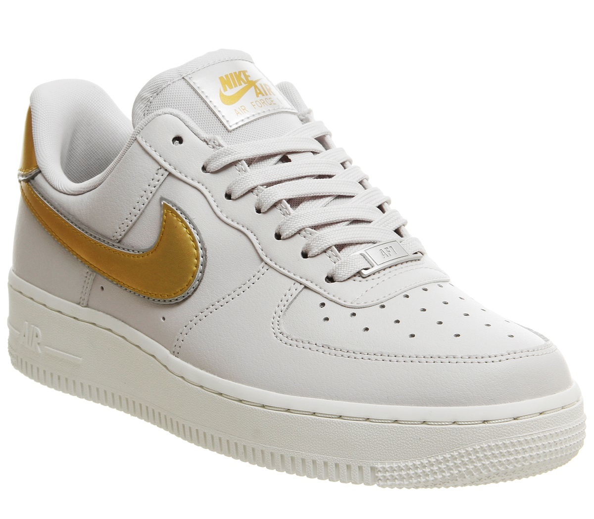 nike grey and gold trainers