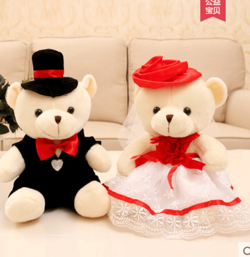 teddy bear and doll
